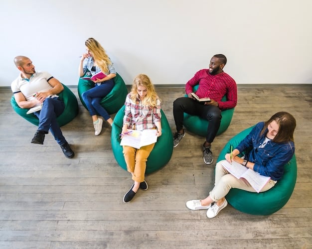 A group of high school students sits in a circle in a classroom, engaged in a discussion led by Mr. Thompson. The students are making eye contact, listening attentively, and displaying body language that suggests active participation and mutual respect.