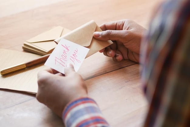 A close-up of a handwritten card to a veteran, focusing on the words of gratitude and appreciation. The card features a simple, patriotic design, and the handwriting is neat and legible. The background is blurred to emphasize the message.