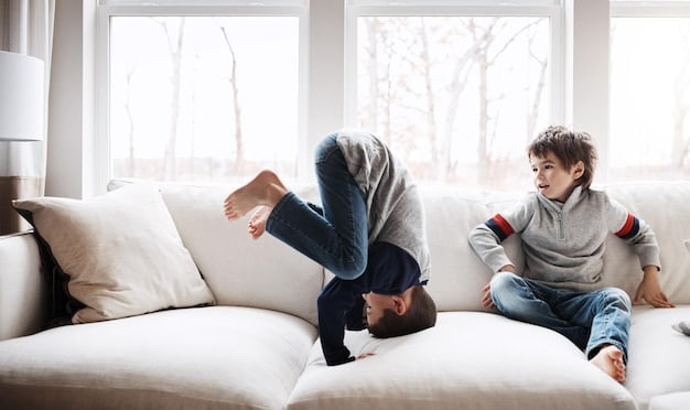 A single father looking exhausted but grateful, sitting on a couch while a teenager plays with his child on the floor. The setting is a cozy living room.