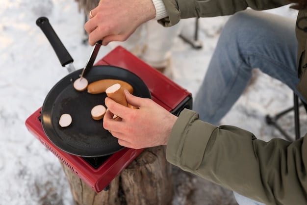 A close-up shot of a hiker using a portable stove to cook a meal in a designated campsite, following Leave No Trace principles. The campsite is clean, with no visible trash or food scraps.