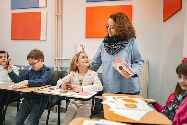 A teacher sitting at a desk, surrounded by students actively participating in a class discussion. The teacher is engaging with a student while other students look on attentively. The classroom is simply furnished but has positive posters and student artwork on the walls. The lighting suggests a focused and friendly atmosphere.