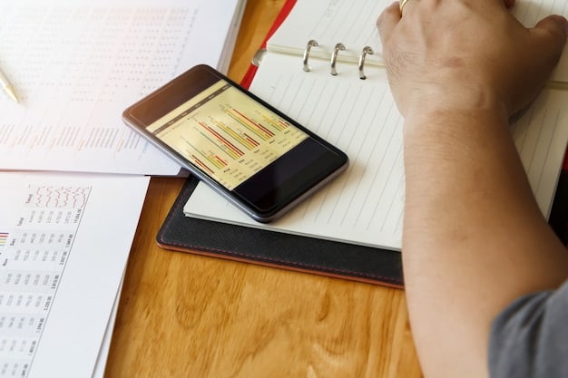 A person using a mobile banking app with a graph showing decreasing debt interest over time, juxtaposed with a calendar highlighting financial planning and budget.