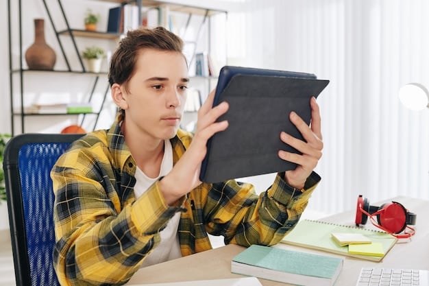 A student sitting at a desk, looking intently at a tablet displaying a digital SAT interface with multiple-choice questions. The background is a modern, light-filled study room.