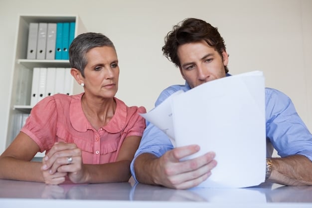 A close-up of a parent and a teacher collaboratively reviewing a document, possibly an IEP, with a pen, magnifying glass, and focused expressions, symbolizing partnership and detailed attention.