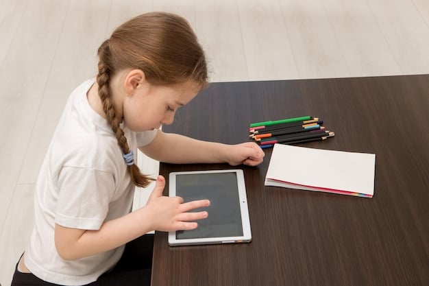 A child using a tablet with assistive technology for learning, highlighting the integration of modern tools in special education. The child is focused and engaged.