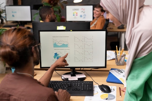 A group of educators in a professional development session, collaboratively analyzing data on student performance and diverse learning styles, with charts and diagrams on a screen in the background.