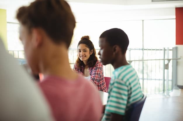 A school counselor or teacher speaking empathetically with a diverse group of teenagers, creating a safe and open space for discussion and emotional support in a modern school setting.
