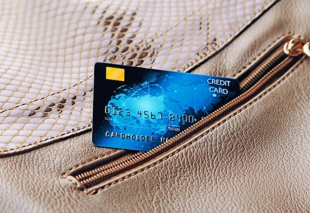 A close-up shot of a credit card with a high APR displayed prominently, next to a calculator and a stack of bills. The image emphasizes the importance of understanding and prioritizing high-interest debt in the journey towards becoming Debt-Free by 2026.