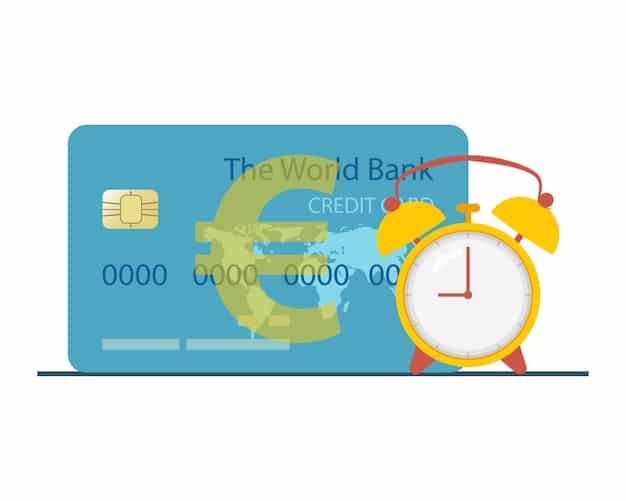 A credit card snapped in half, resting on top of a