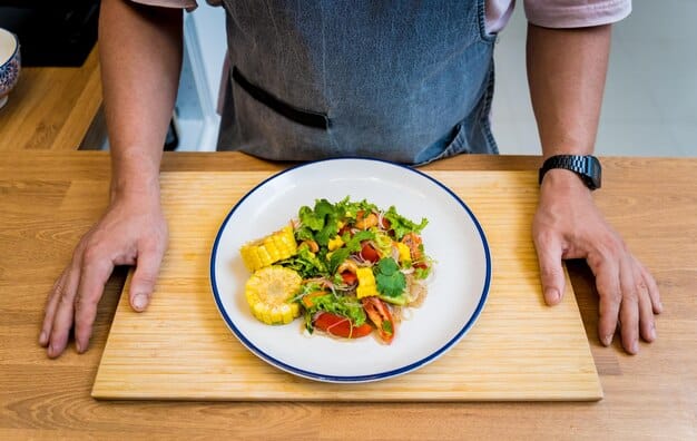 A person using a small plate to serve their meal, filled with balanced portions of vegetables, lean protein, and whole grains. This visually emphasizes the concept of portion control for effective weight management in Preventing Diabetes: Simple Lifestyle Changes That Can Cut Your Risk by 40%.