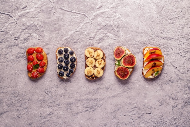 A split image showing two types of seemingly healthy snacks. On one side, a fruit smoothie with a highlighted label showing high sugar content. On the other side, a handful of nuts with a label showing healthy fats and low sugar. Illustrates making informed choices even with products marketed as healthy.