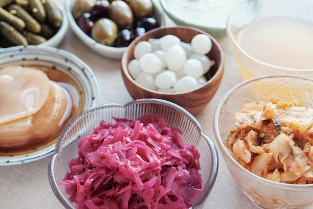 A visually appealing shot of various bowls filled with fermented foods, including kimchi, sauerkraut, yogurt, and kombucha. The foods are brightly colored and arranged to highlight the diversity and health benefits of fermentation, with the backdrop softly blurred to focus on the foods.