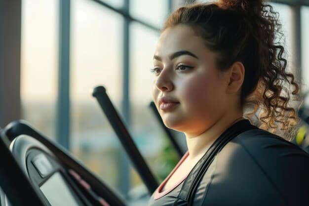 A close-up shot of a person running on a treadmill, focusing on their determined expression and the sweat on their forehead. The background is slightly blurred, emphasizing the individual's effort and dedication to exercise. This visually represents the dedication and effort tied to the new research: the link between exercise and brain health.